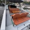 Saxdor 320 GTO cockpit avec banquettes cuir cognac et table teck Saxdor 320 GTO cockpit avec banquettes cuir cognac et table teck
